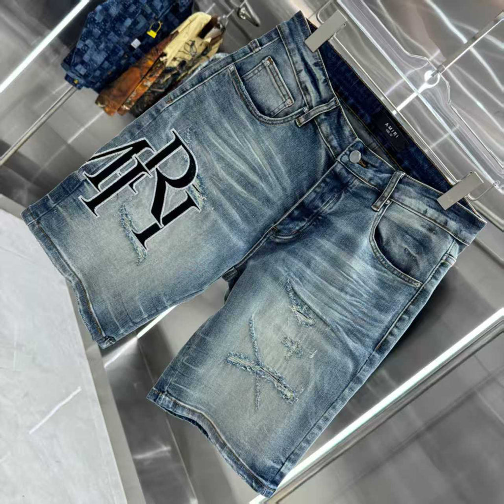Ripped letter embroidered jeans