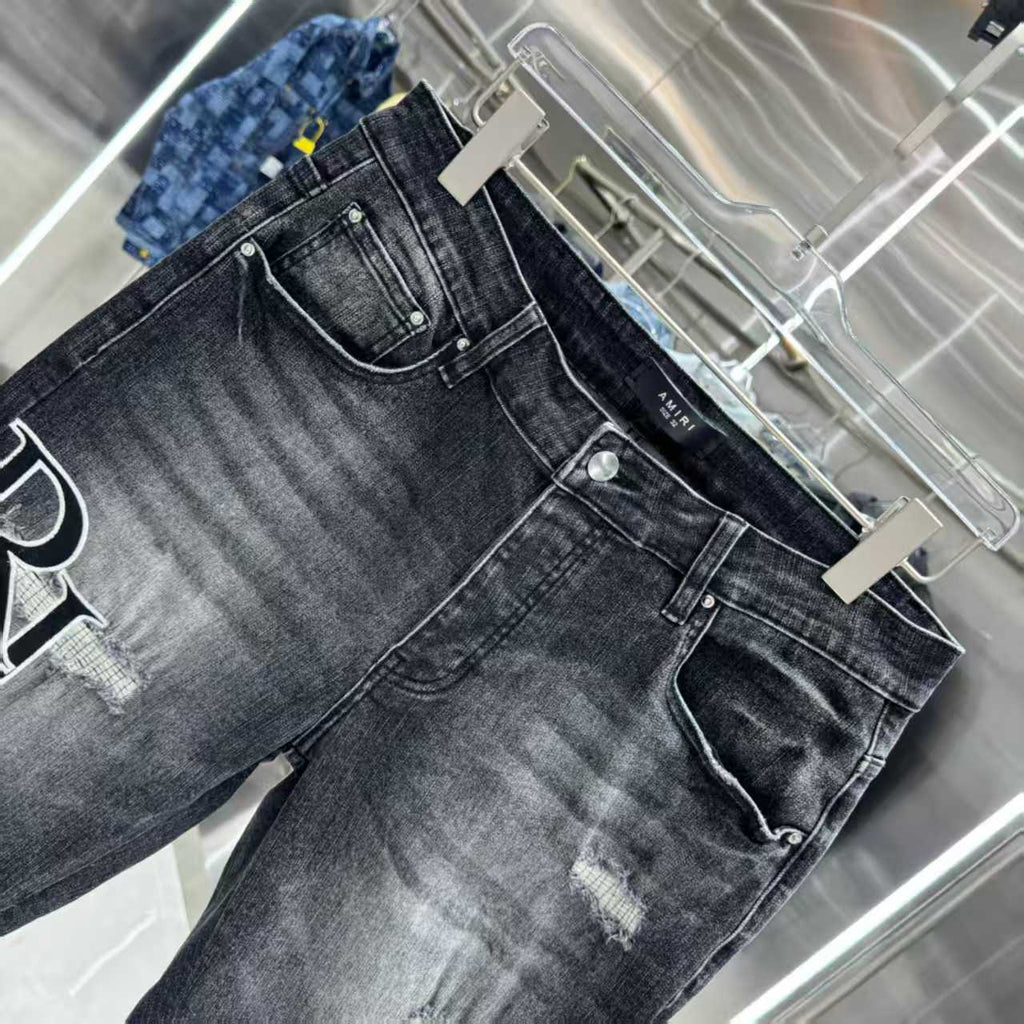 Ripped letter embroidered jeans