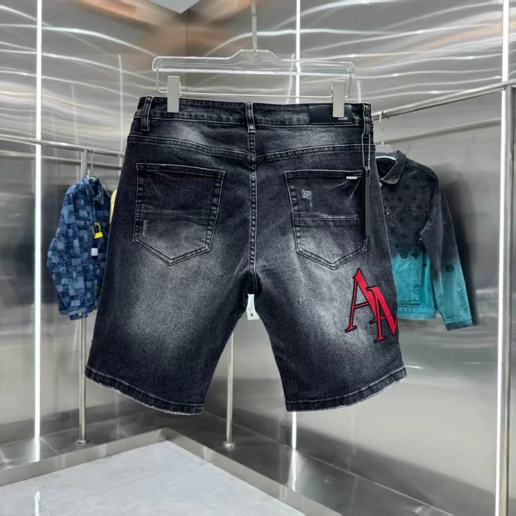 Ripped letter embroidered jeans