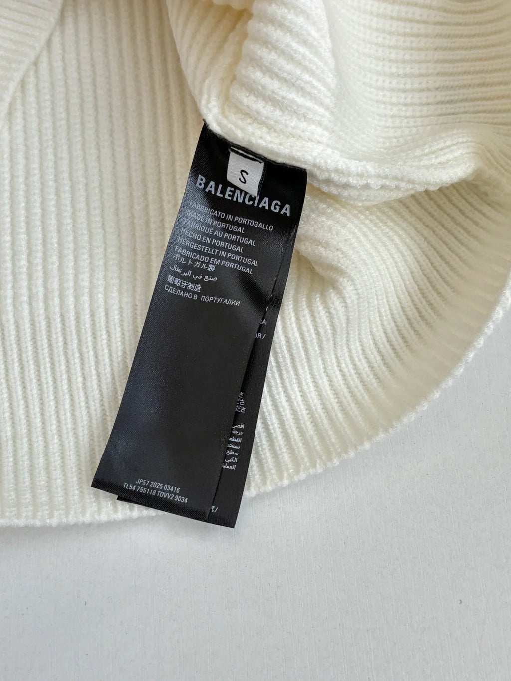 Knitted round neck sweater with armband