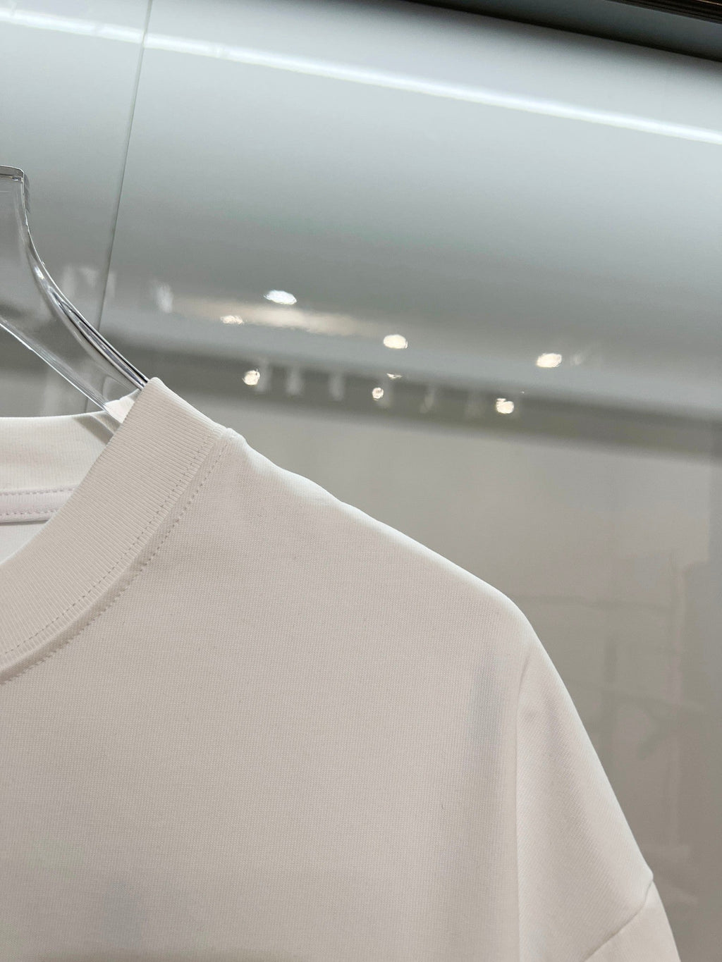 Embroidered letter t-shirt with front and back vines