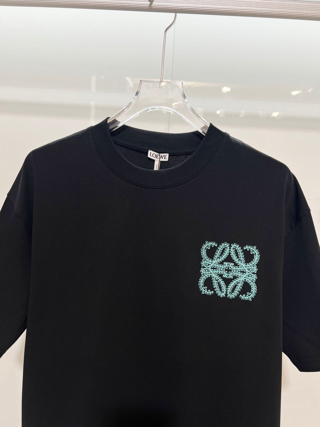 Embroidered letter t-shirt with front and back vines