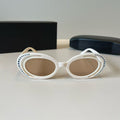 Explosive elliptical sunglasses