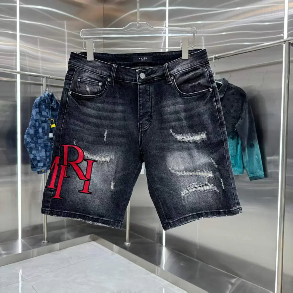 Ripped letter embroidered jeans