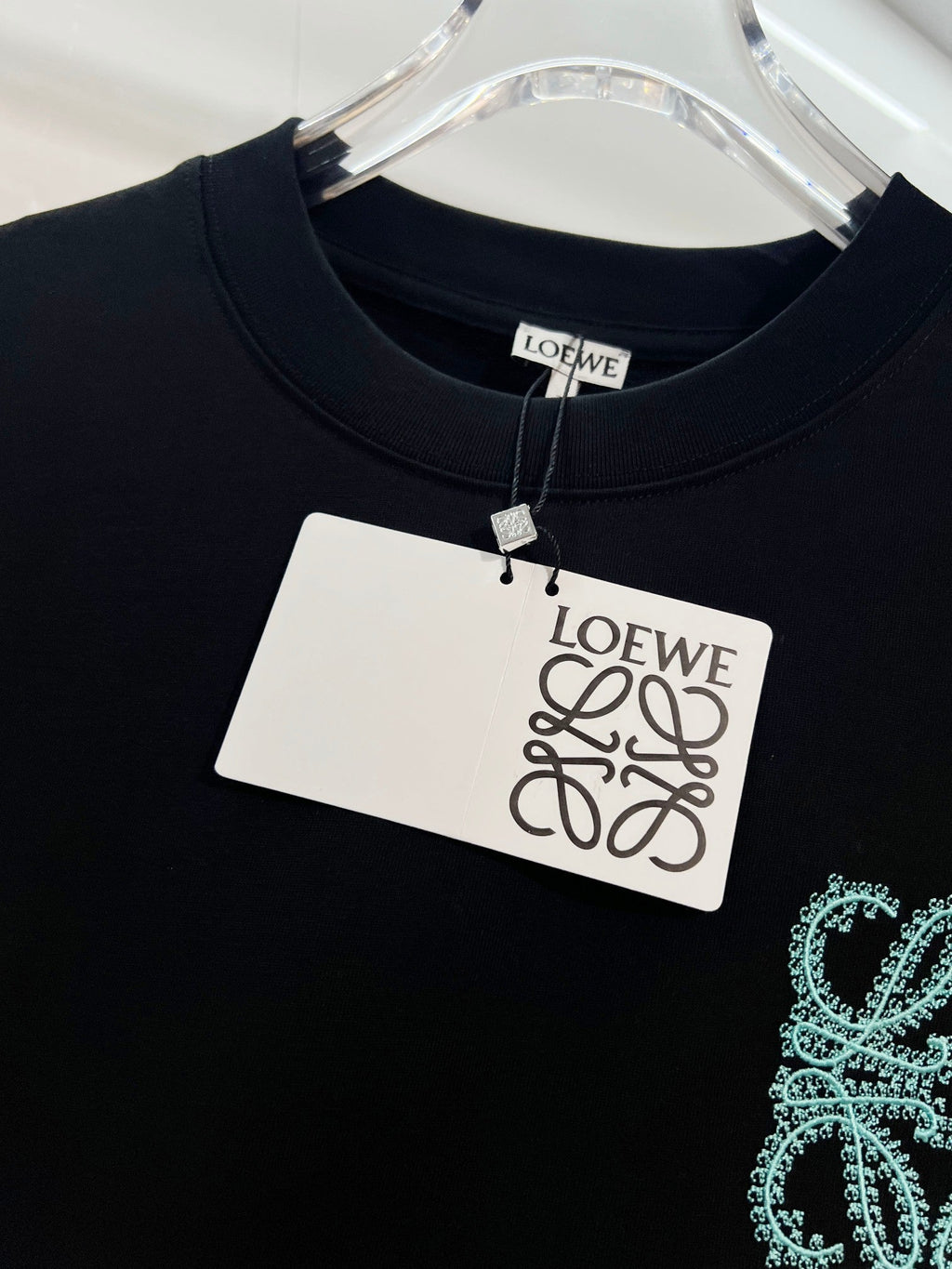 Embroidered letter t-shirt with front and back vines