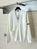 Knitted cardigan sweater with armband