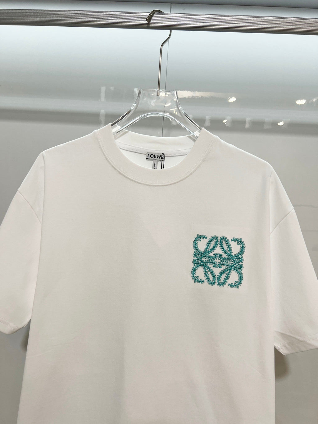 Embroidered letter t-shirt with front and back vines