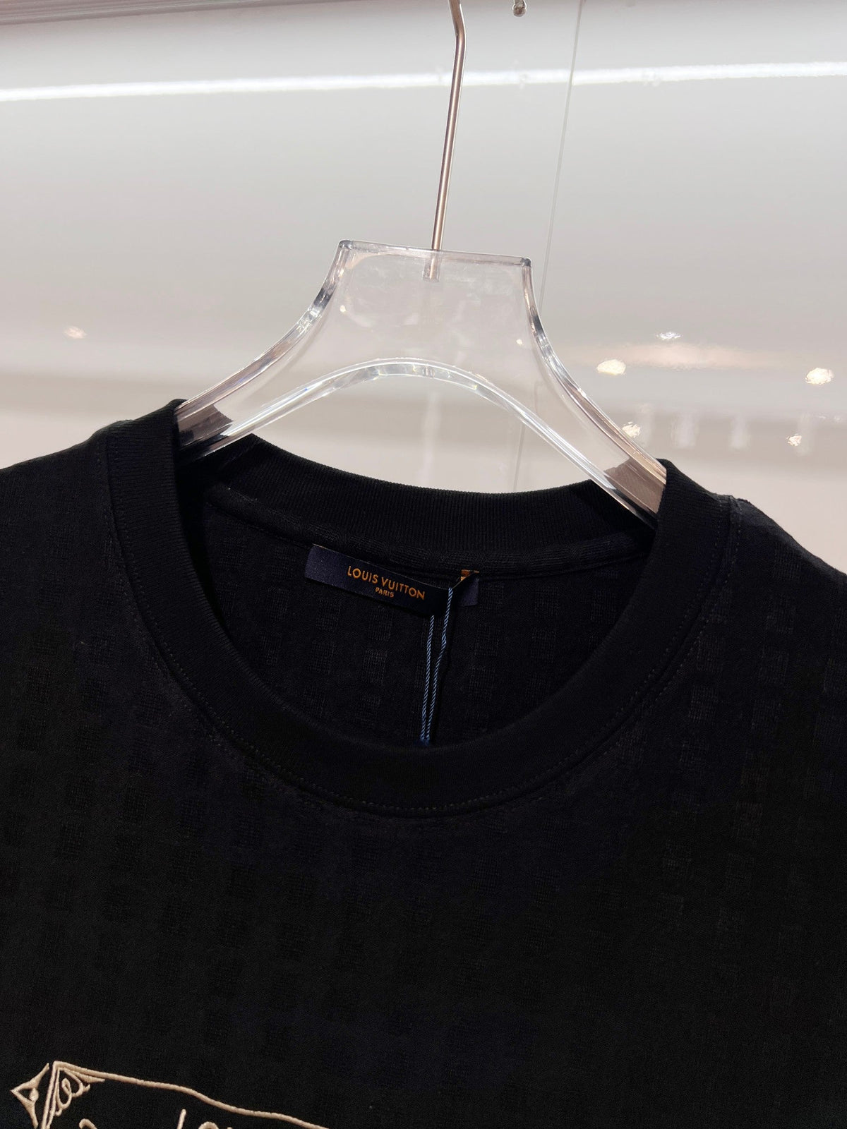 High density gold embroidered T-shirt