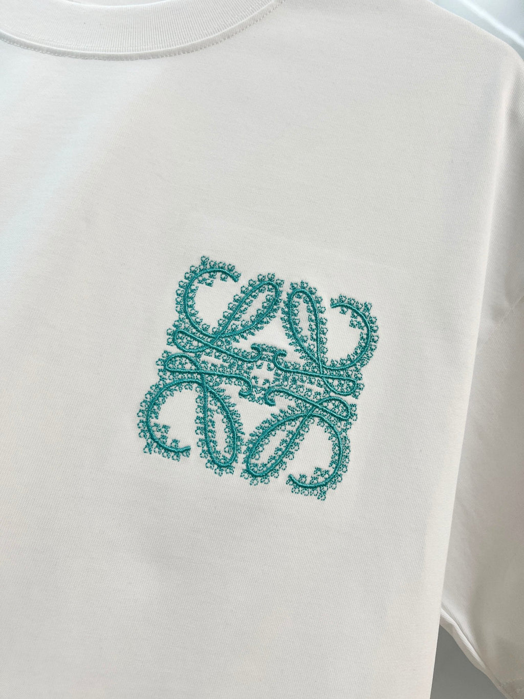 Embroidered letter t-shirt with front and back vines