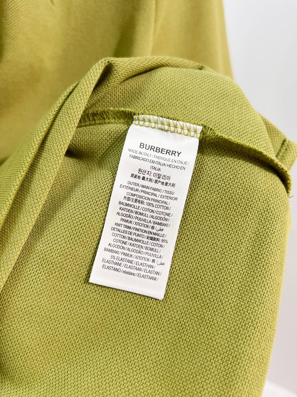 Color blocked flat machine collar with dark embroidery letters polo shirt