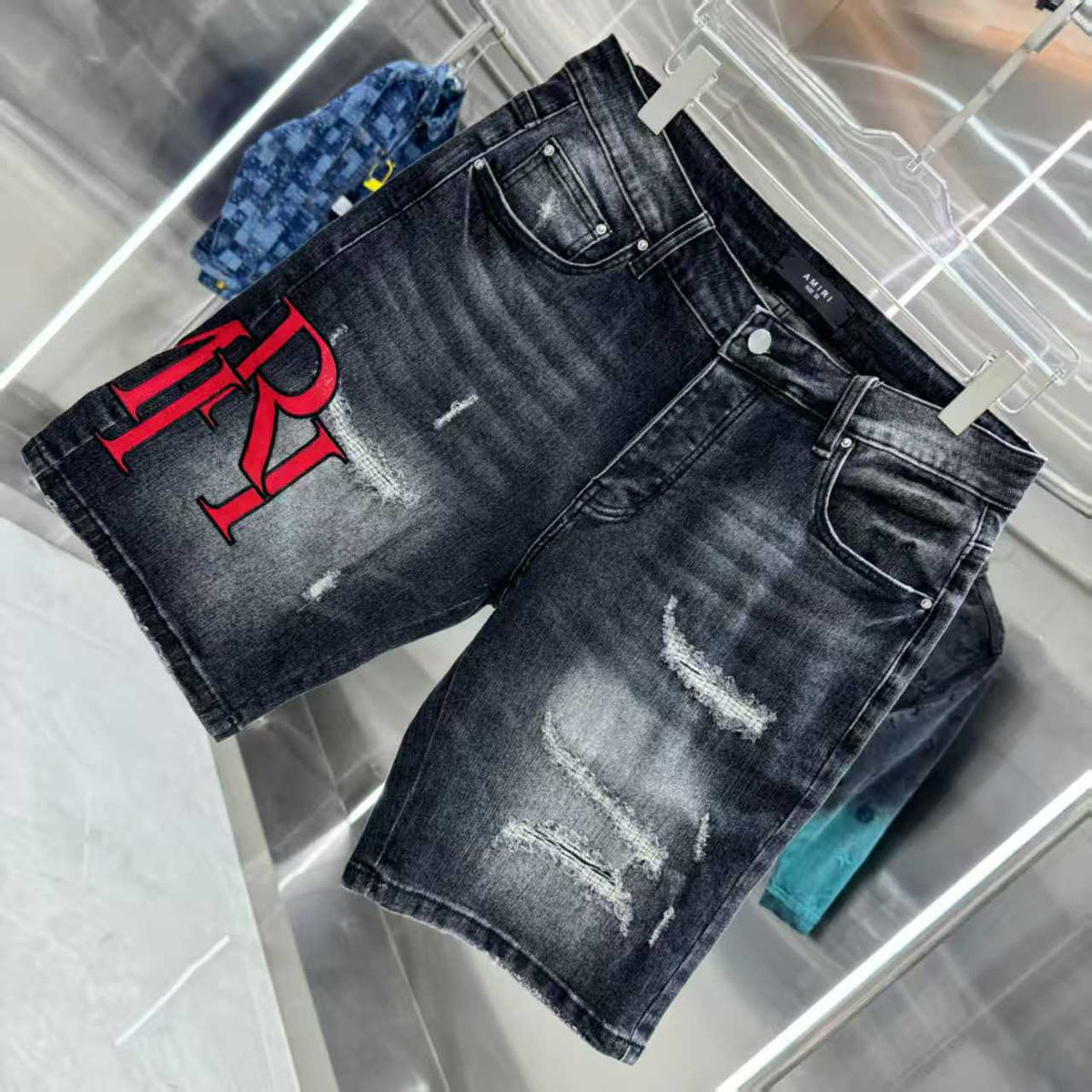Ripped letter embroidered jeans
