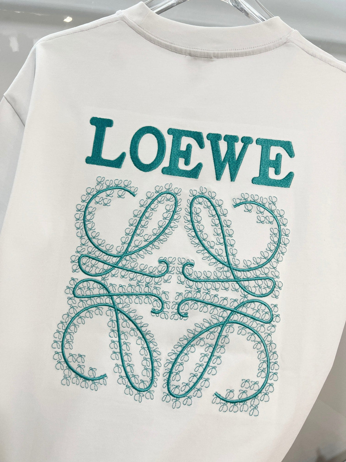 Embroidered letter t-shirt with front and back vines