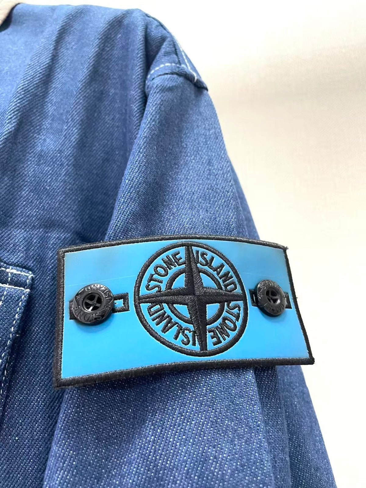 Denim color changing badge jacket