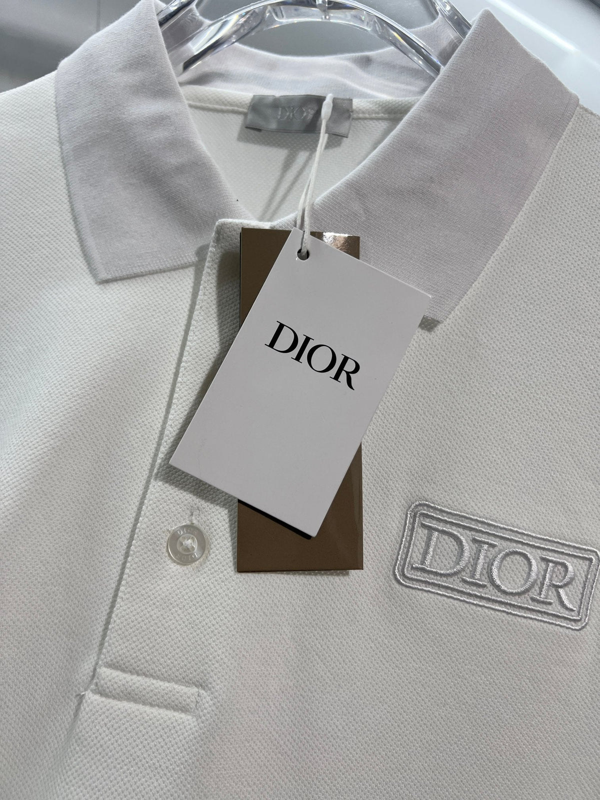 Solid color chest embroidered small letter polo shirt