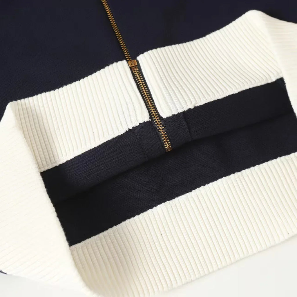 New striped contrasting stand up collar sweater