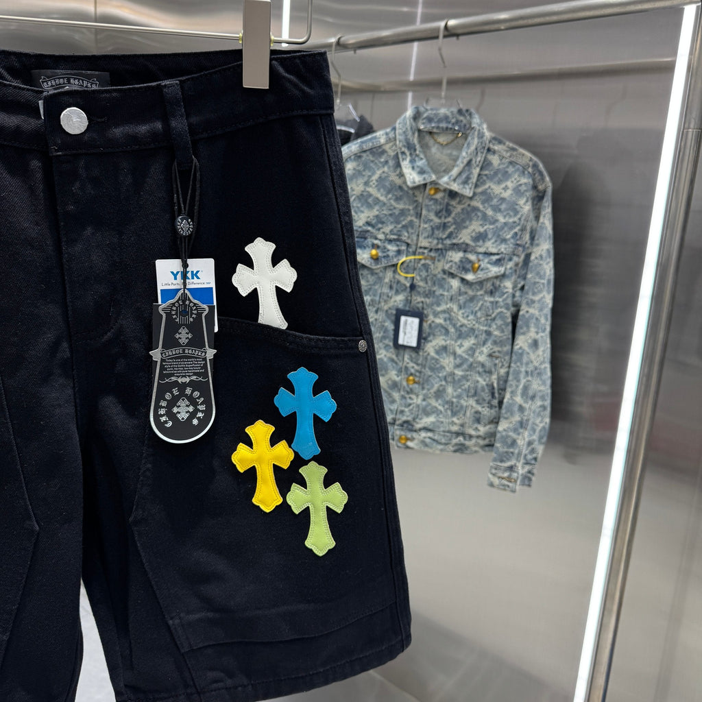 Embroidered cross denim shorts with torn holes