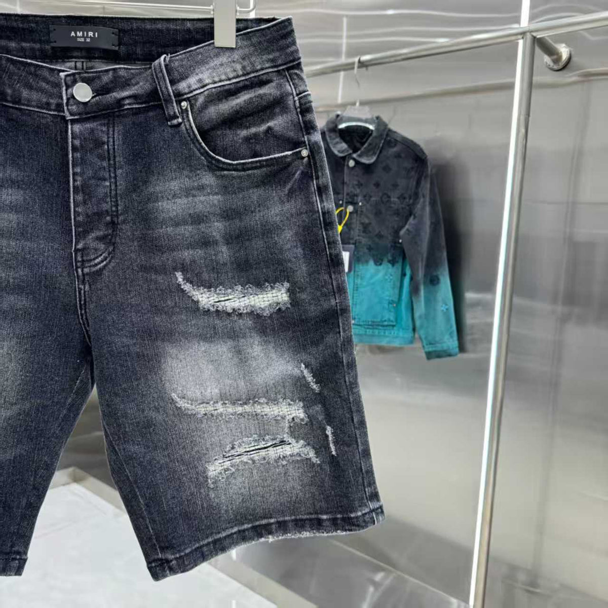 Ripped letter embroidered jeans