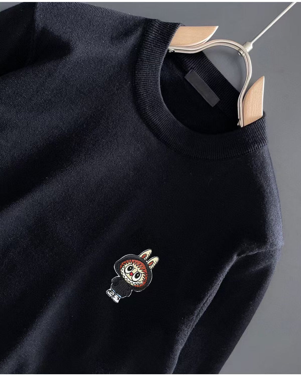 New embroidered round neck sweater