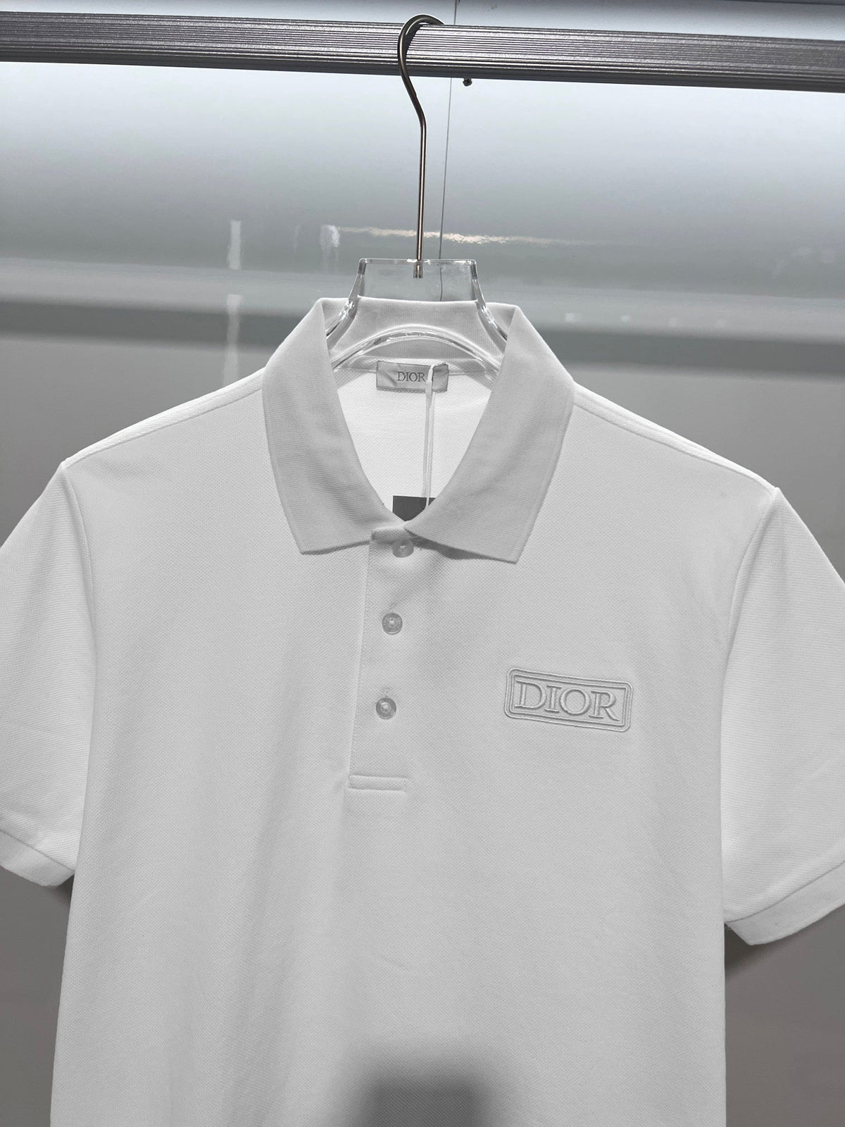 Solid color chest embroidered small letter polo shirt