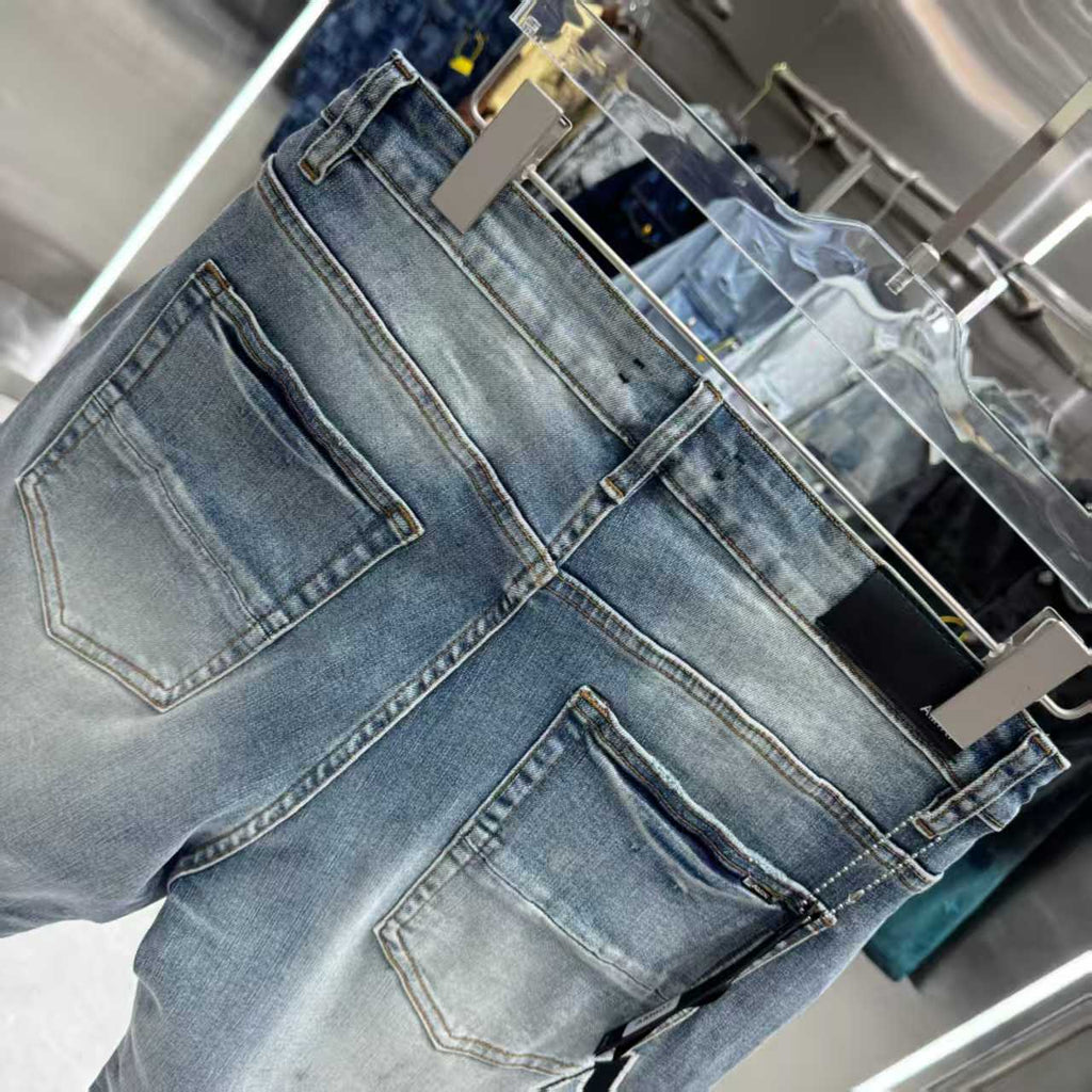 Ripped letter embroidered jeans