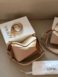 Color blocked geometric bag with leather shoulder straps