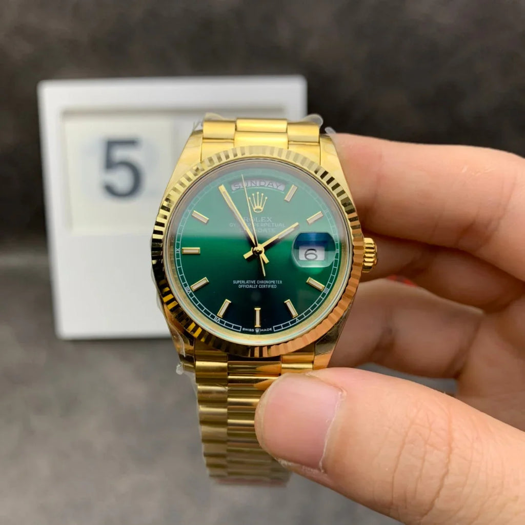 Yellow gold - Green dial - Automatic - 36mm