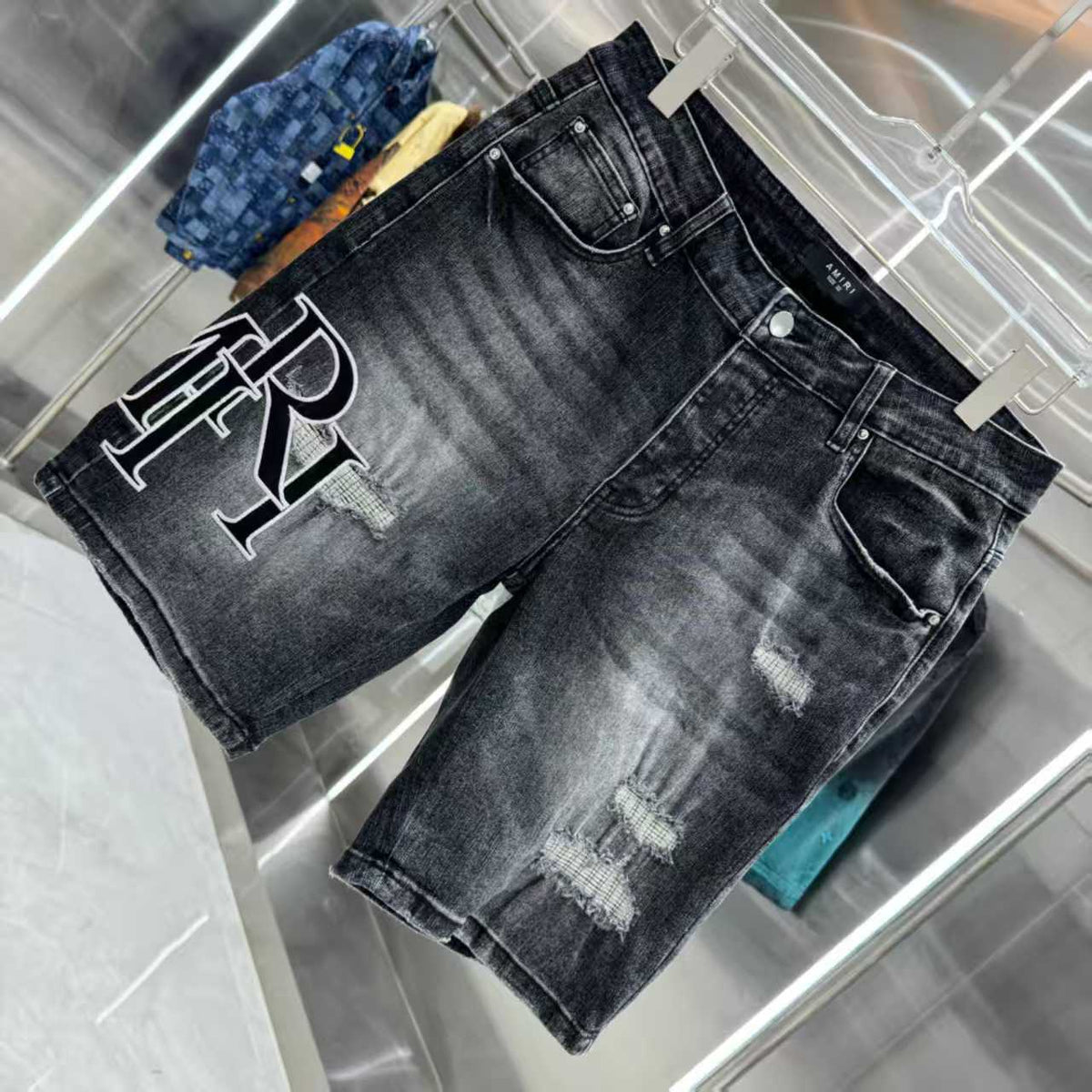 Ripped letter embroidered jeans