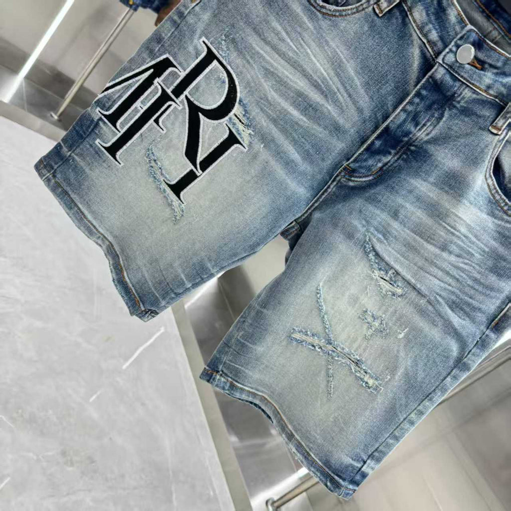 Ripped letter embroidered jeans