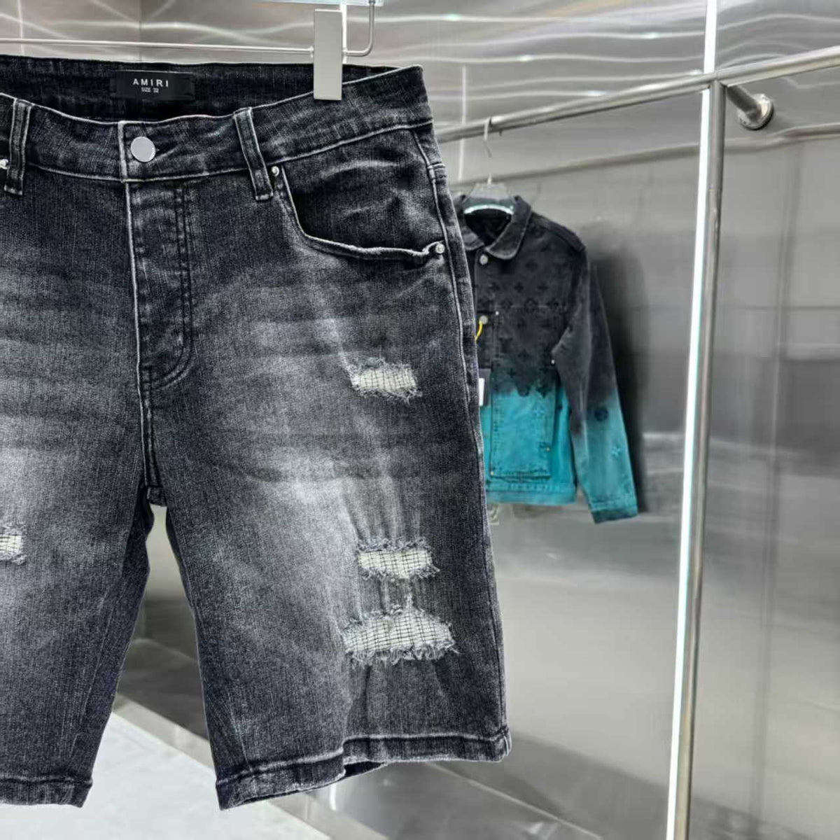 Ripped letter embroidered jeans