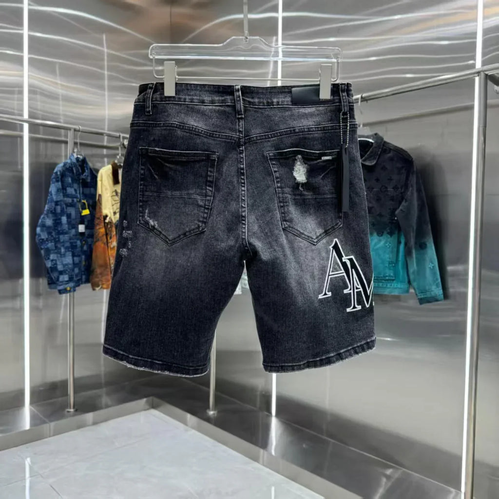 Ripped letter embroidered jeans