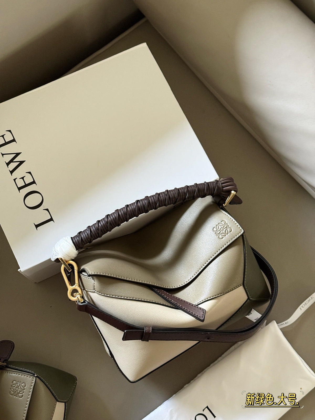 Woven handle, color blocked geometric bag, cowhide