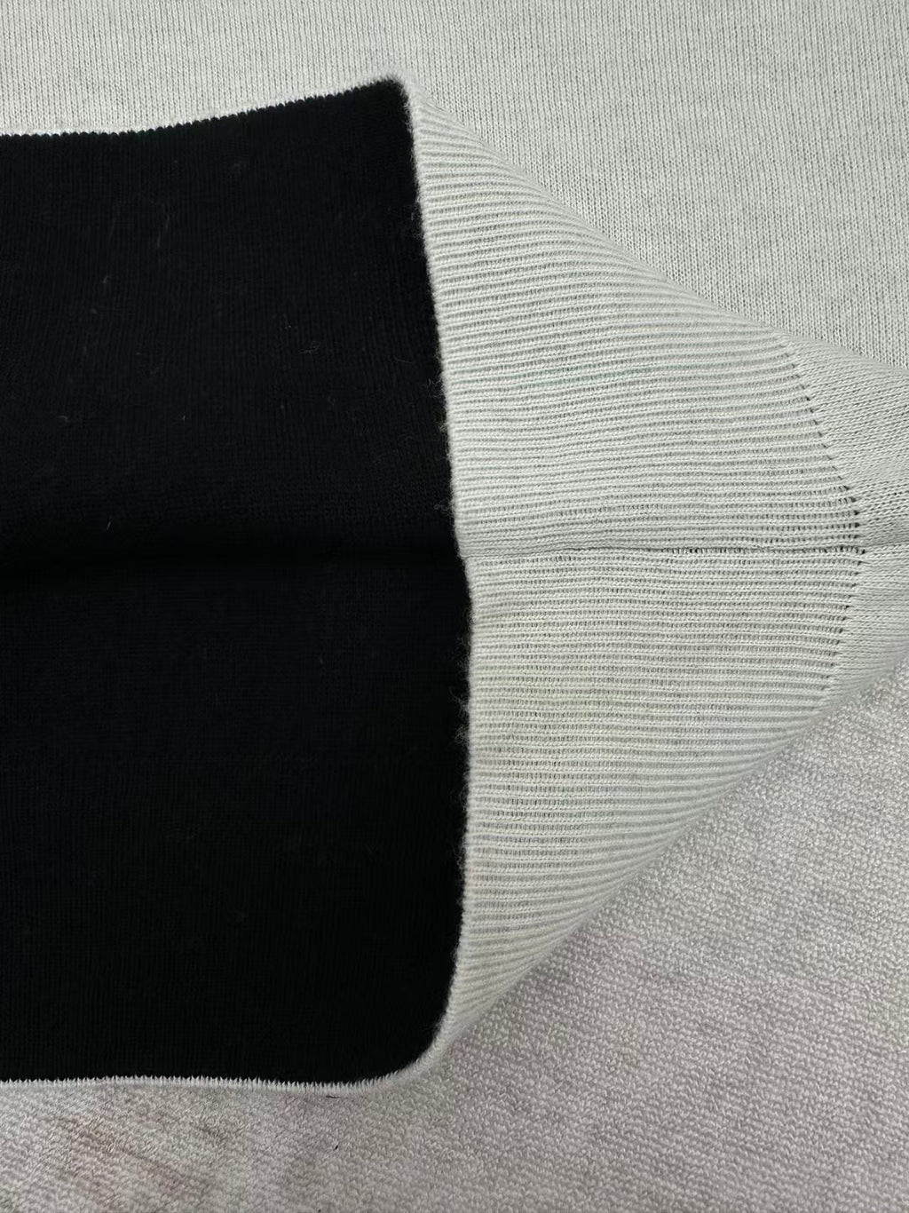 Embroidered jacquard sweater