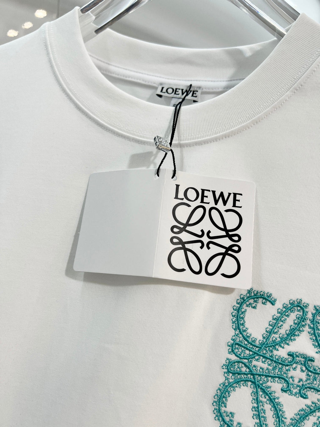 Embroidered letter t-shirt with front and back vines