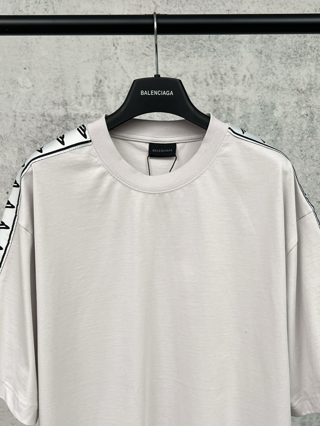Artistic woven ribbon embellishment, washed and worn short sleeved T-shirt