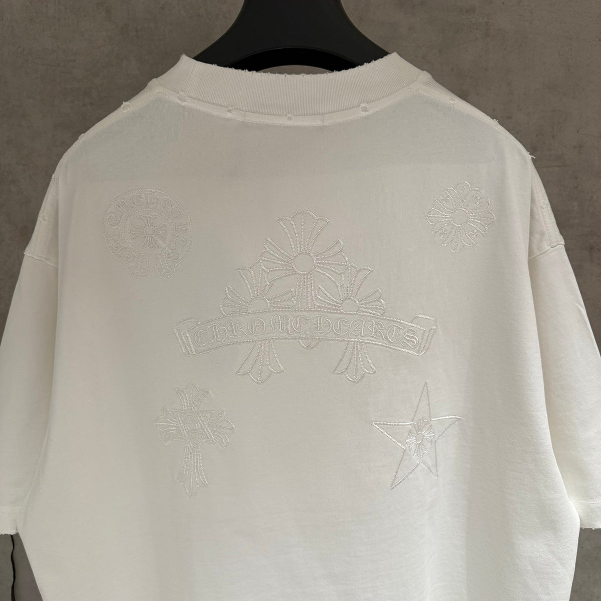 Embroidered T-shirt with front and back panels