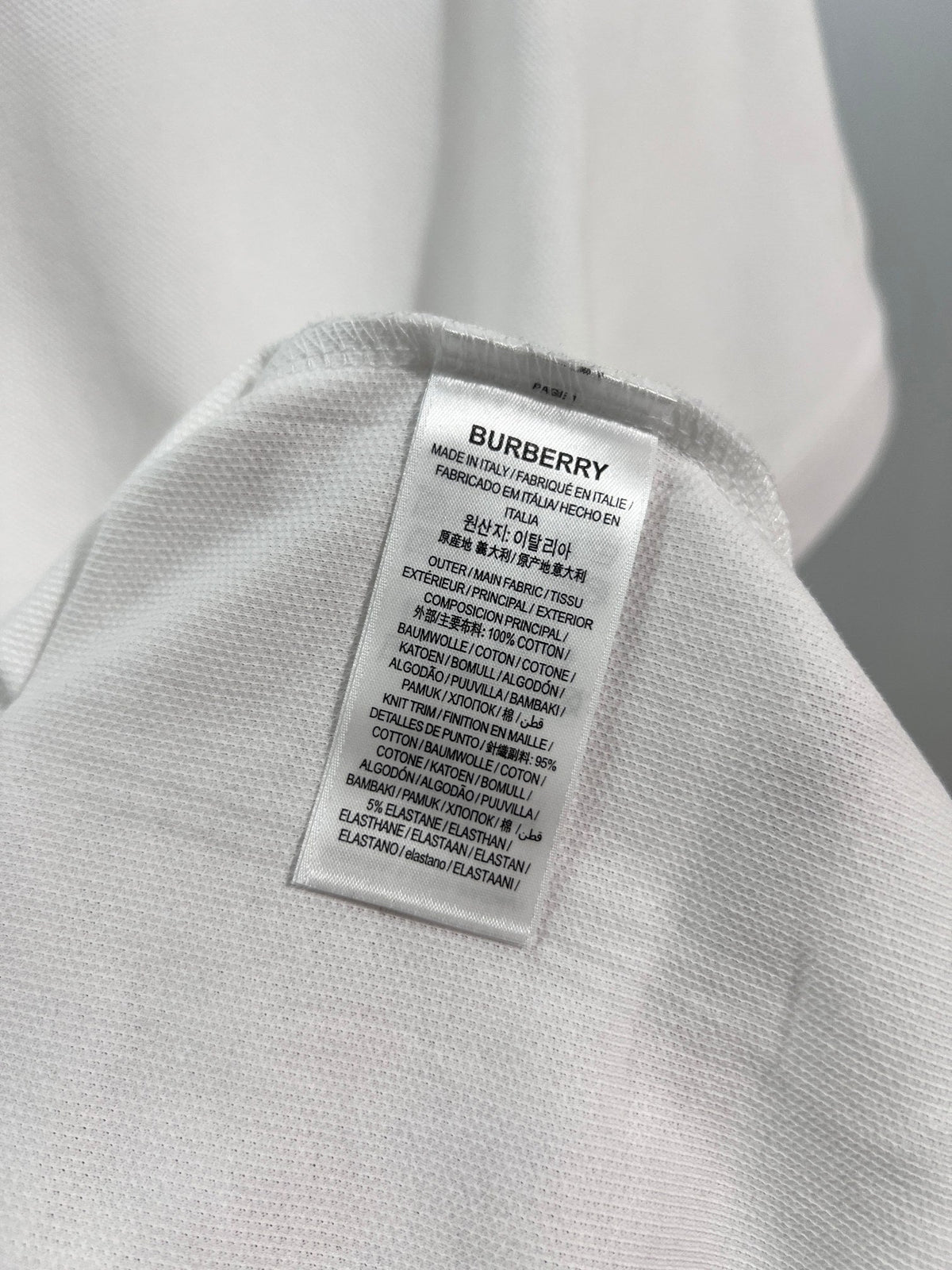 Minimally spliced contrasting plaid collar with letter polo shirt