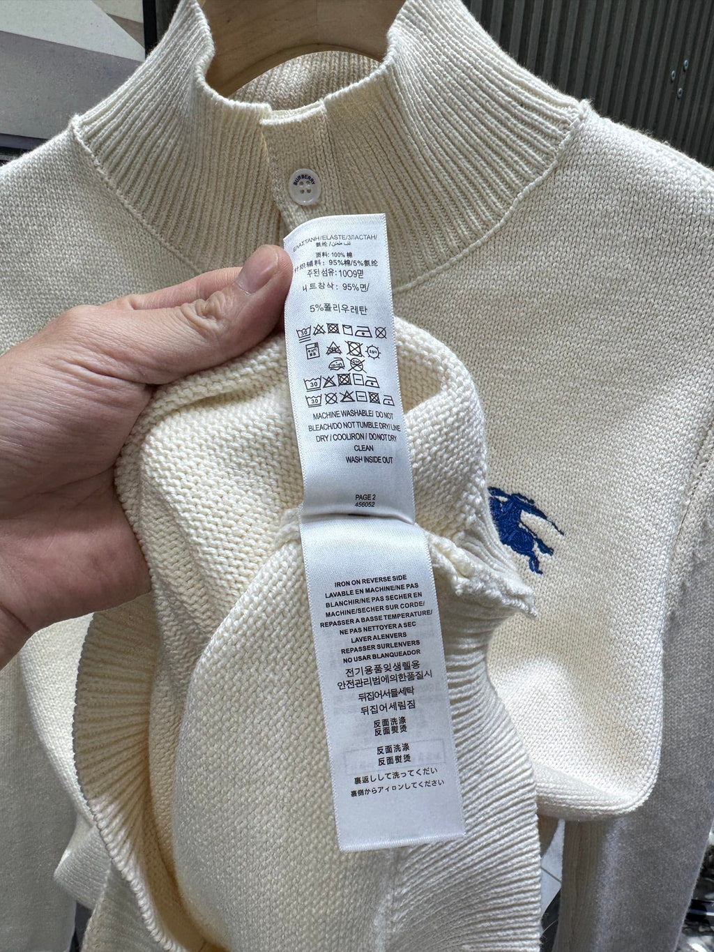 Small embroidery high neck pullover with half collar buckle knitted sweater