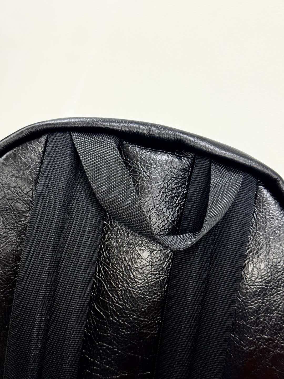 Oil cured leather backpack