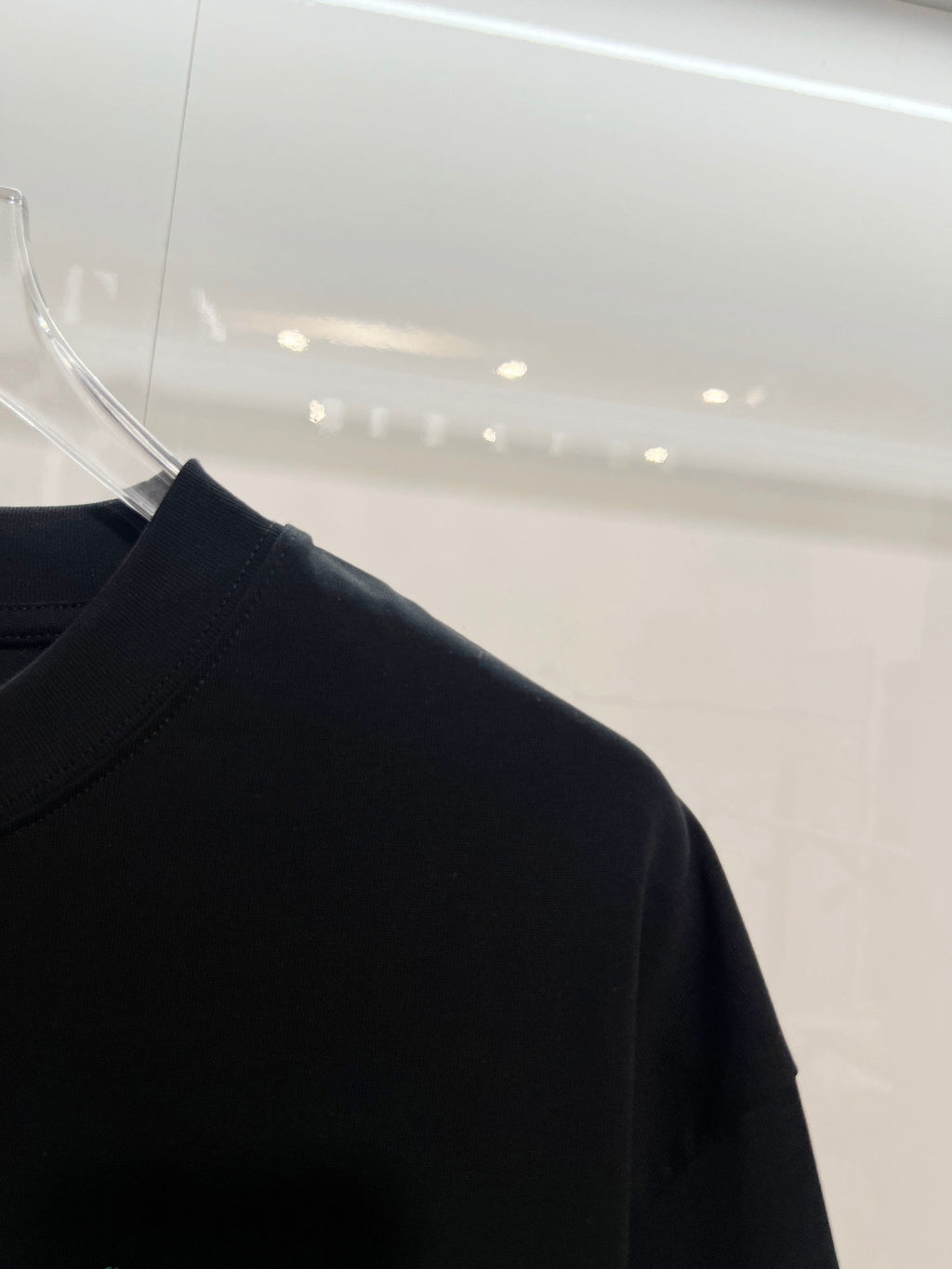 Embroidered letter t-shirt with front and back vines