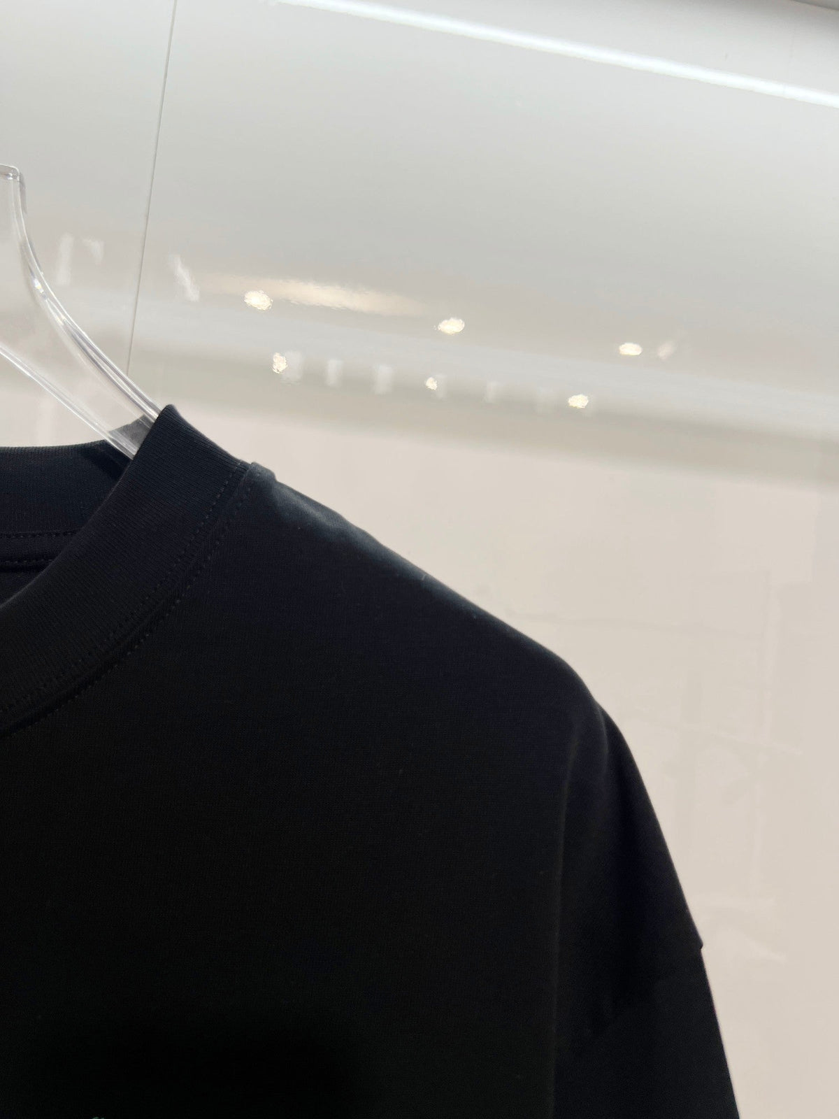 Embroidered letter t-shirt with front and back vines