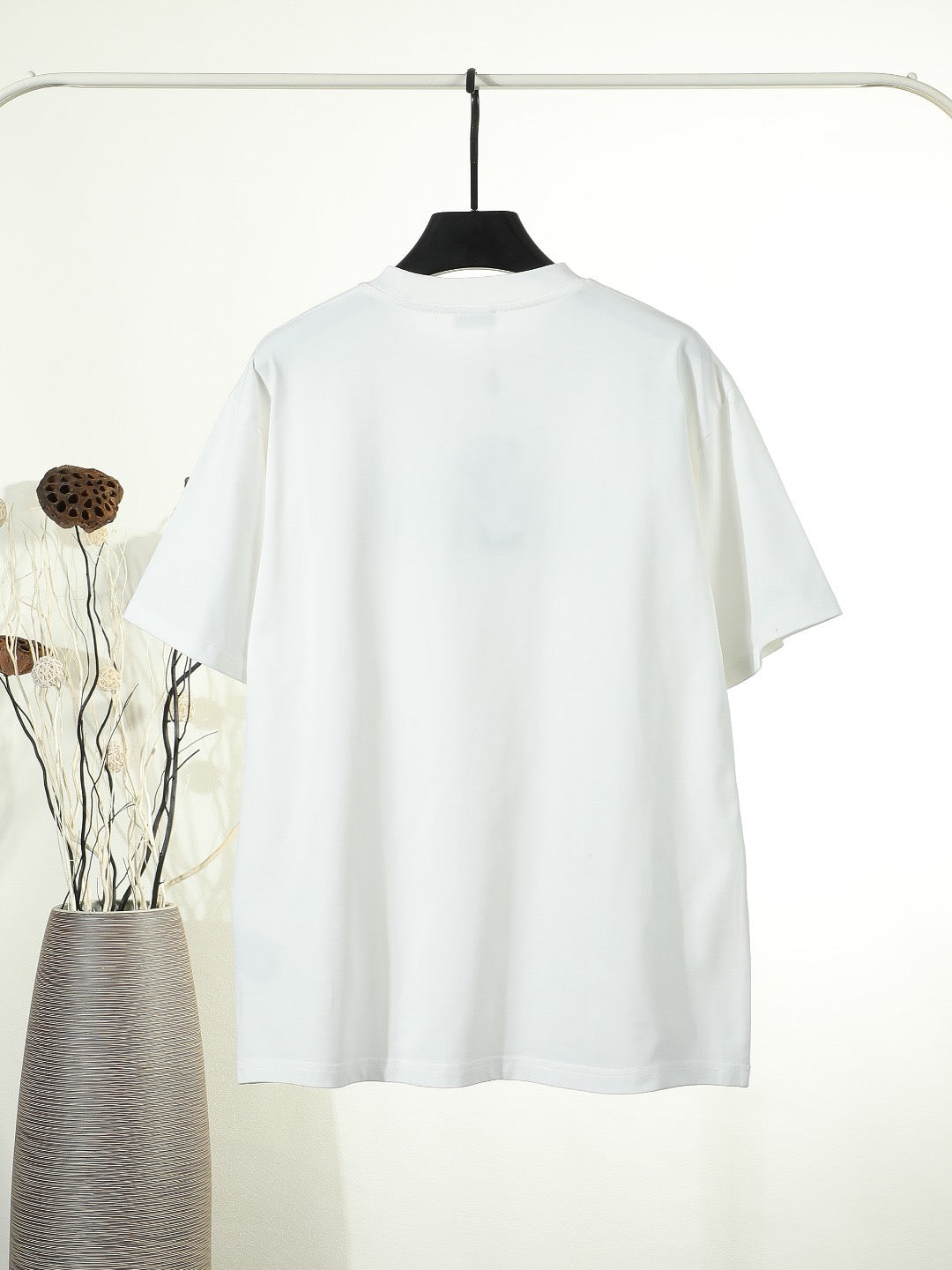 Embroidered T-shirt with floral letter stickers on the chest