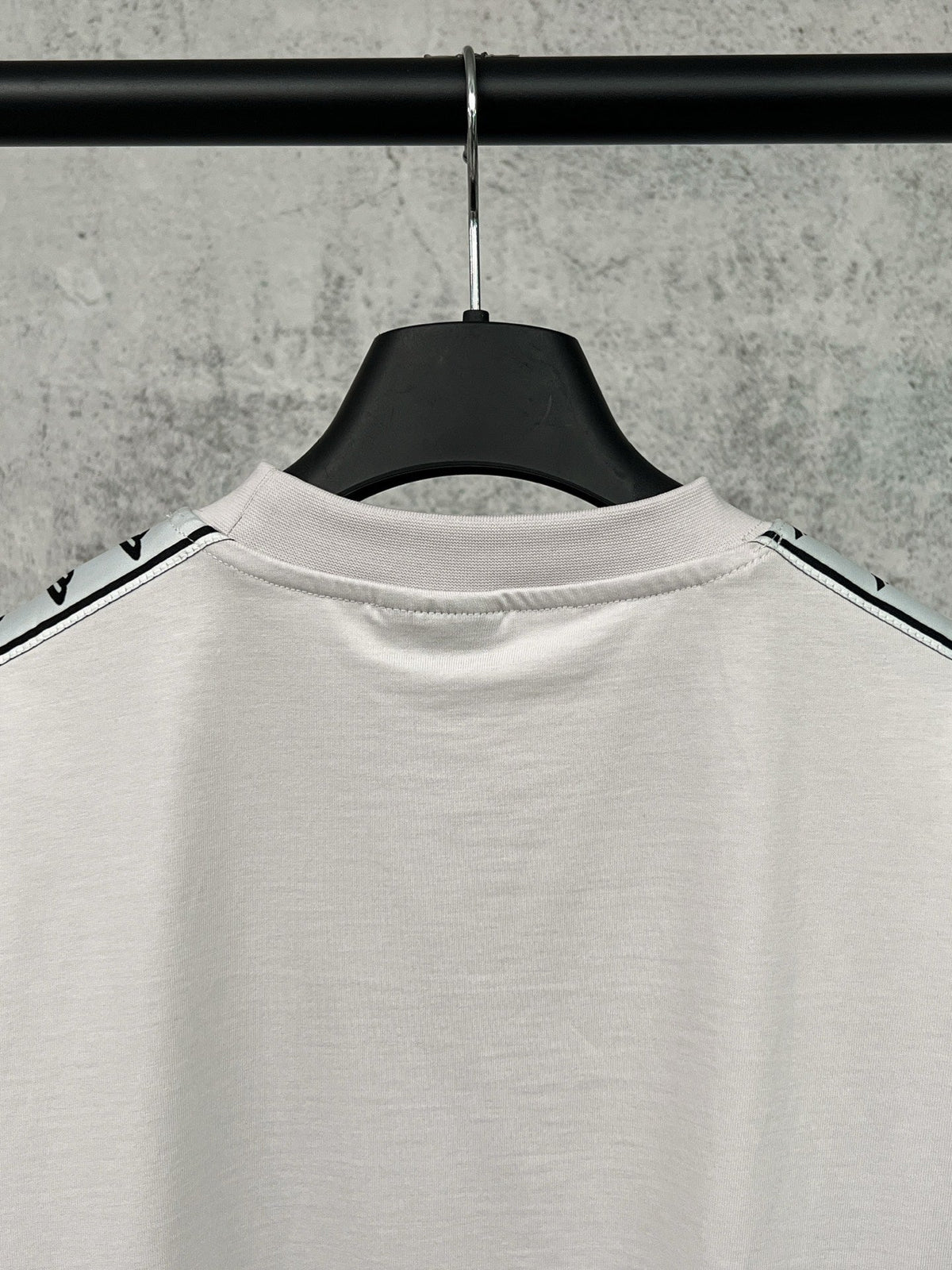 Artistic woven ribbon embellishment, washed and worn short sleeved T-shirt