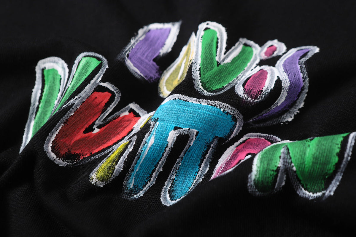 Hand drawn graffiti, splashed ink letters, logo, short sleeved t-shirt